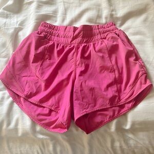 sonic pink, lululemon hotty hot shorts: (size 2: 4 inch)